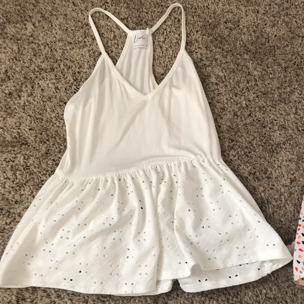 White crop top right in the top flowy on the bottom!